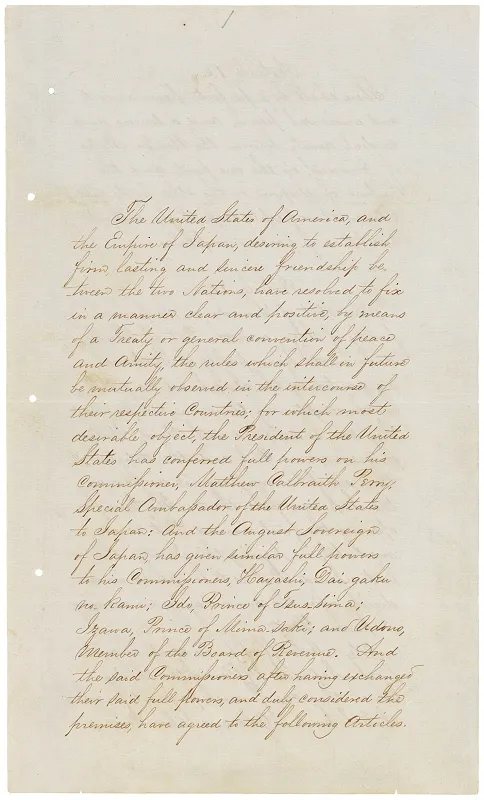 The first page of the English-language Treaty of Kanagawa is written in dark ink on a tall sheet and signed at the bottom by Matthew C. Perry.