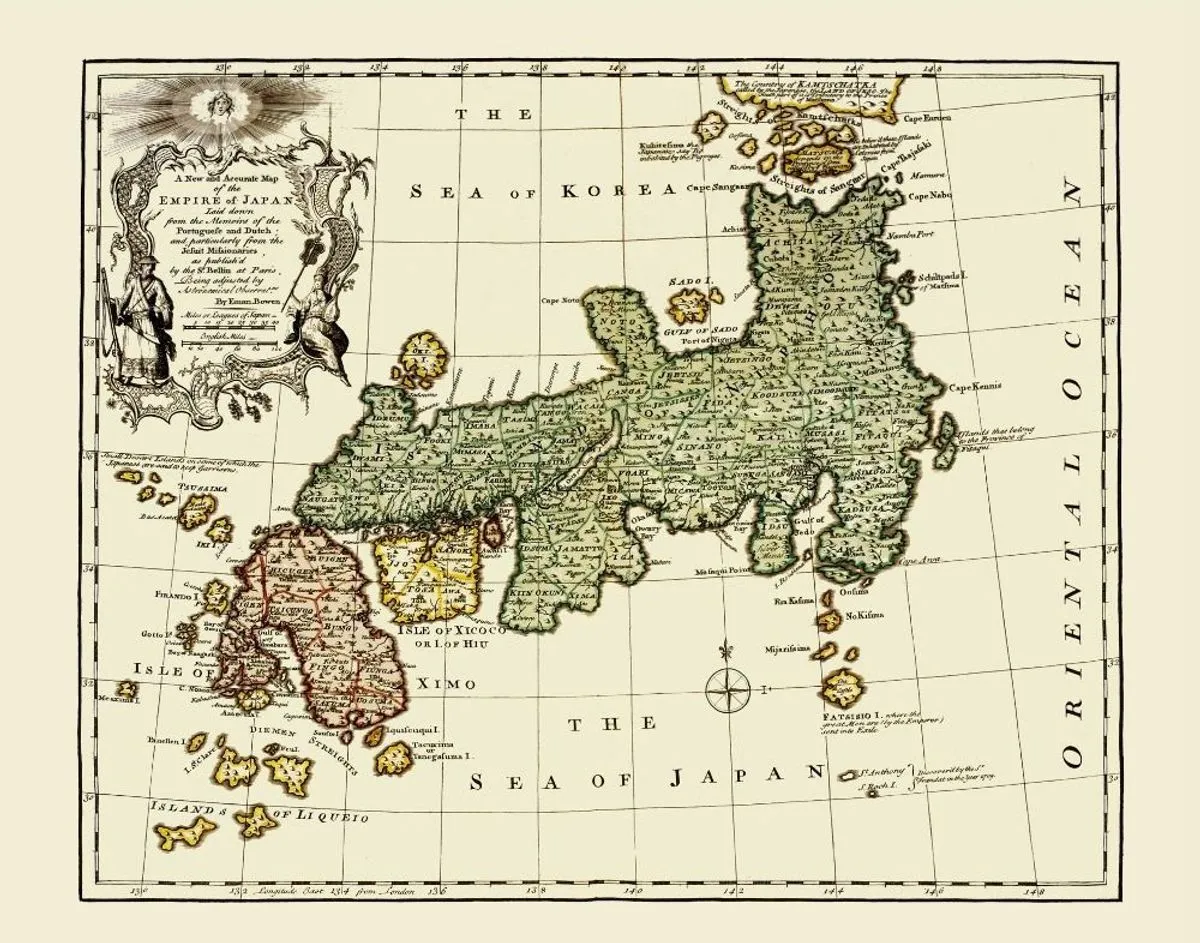 An engraved 1752 map of Japan by Emanuel Bowen, showing the islands, surrounding seas, place names, and a decorative title cartouche.